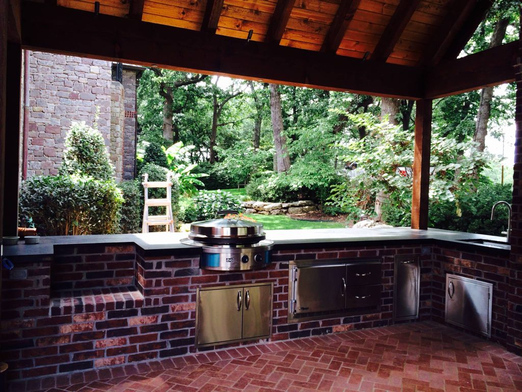 Mid-sized transitional backyard brick patio kitchen photo in Other with a roof extension by Jack Wills Patio & Fireplace | Outdoor Photos | Porch | Landscaping | Landscape Design | Outdoor Living Space | Porch Design Ideas | Outdoor Living Space Ideas | Backyard Design