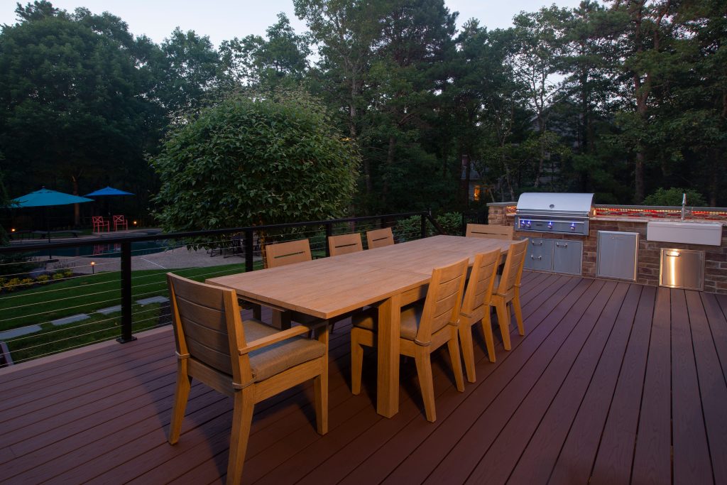 Mid-sized transitional backyard outdoor kitchen deck photo in Philadelphia with no cover