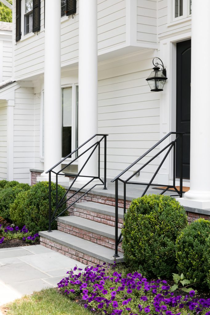 Mid-sized transitional concrete front porch idea in New York with a roof extension by Cacciola Iron Works | Outdoor Photos | Porch | Landscaping | Landscape Design | Outdoor Living Space | Porch Design Ideas | Outdoor Living Space Ideas | Backyard Design