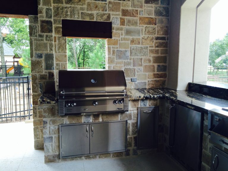 Mid-sized transitional concrete porch photo in Other with a roof extension