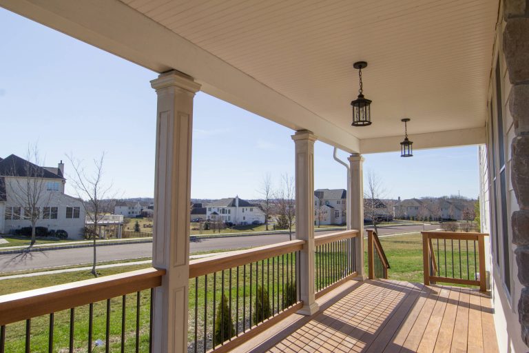 Mid-sized transitional front porch idea in Philadelphia with decking and a roof extension by Dames Design | Outdoor Photos | Porch | Landscaping | Landscape Design | Outdoor Living Space | Porch Design Ideas | Outdoor Living Space Ideas | Backyard Design