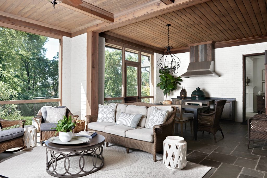 Mid-sized transitional stone porch photo in Nashville with a roof extension by Looney Ricks Kiss | Outdoor Photos | Porch | Landscaping | Landscape Design | Outdoor Living Space | Porch Design Ideas | Outdoor Living Space Ideas | Backyard Design