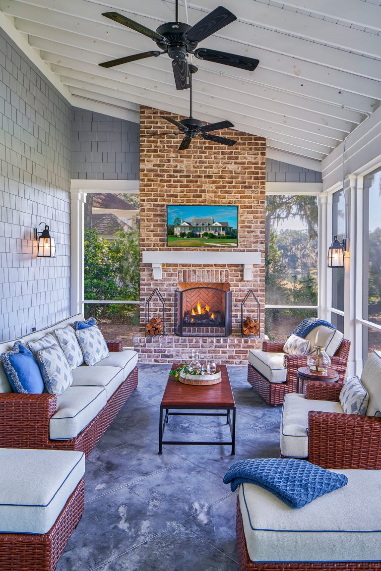 Mid-sized transitional tile screened-in side porch photo in Atlanta with a roof extension by Kelly Caron Designs, ASID, NCIDQ | Outdoor Photos | Porch | Landscaping | Landscape Design | Outdoor Living Space | Porch Design Ideas | Outdoor Living Space Ideas | Backyard Design