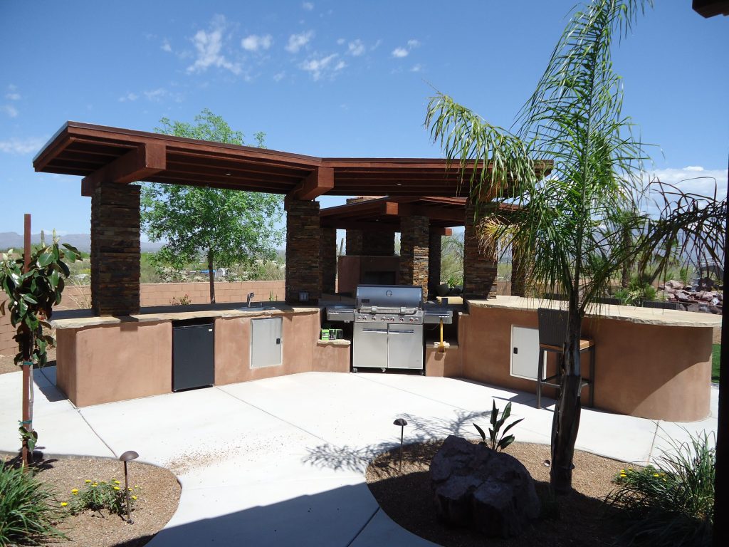 Mid-sized trendy backyard concrete patio kitchen photo in Phoenix with a gazebo