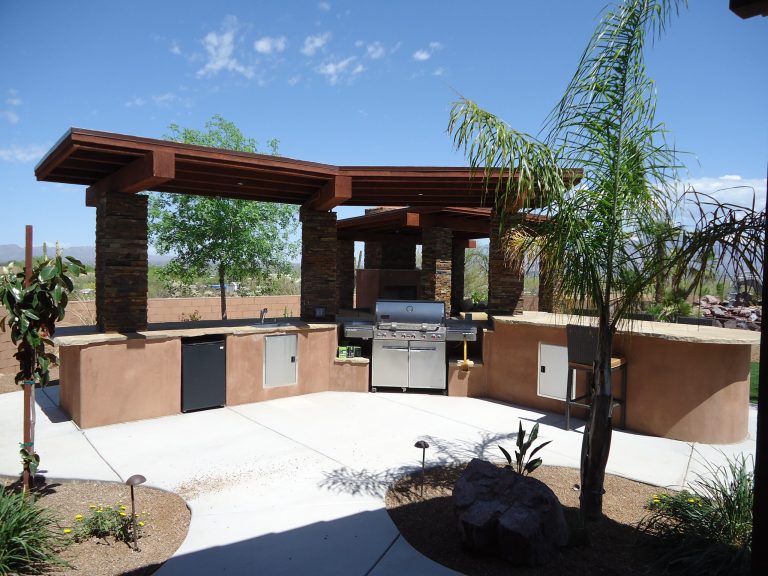Mid-sized trendy backyard concrete patio kitchen photo in Phoenix with a gazebo