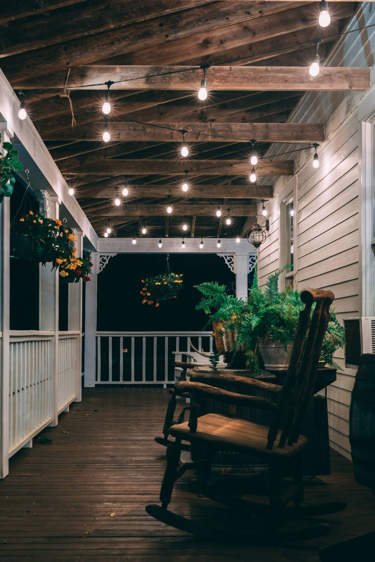 Mid-sized trendy porch idea in Chicago with decking and a roof extension by Night Light, Inc. | Outdoor Photos | Porch | Landscaping | Landscape Design | Outdoor Living Space | Porch Design Ideas | Outdoor Living Space Ideas | Backyard Design