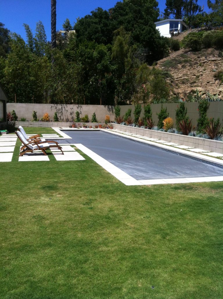 Mid-sized trendy rectangular and tile lap pool photo in Los Angeles
