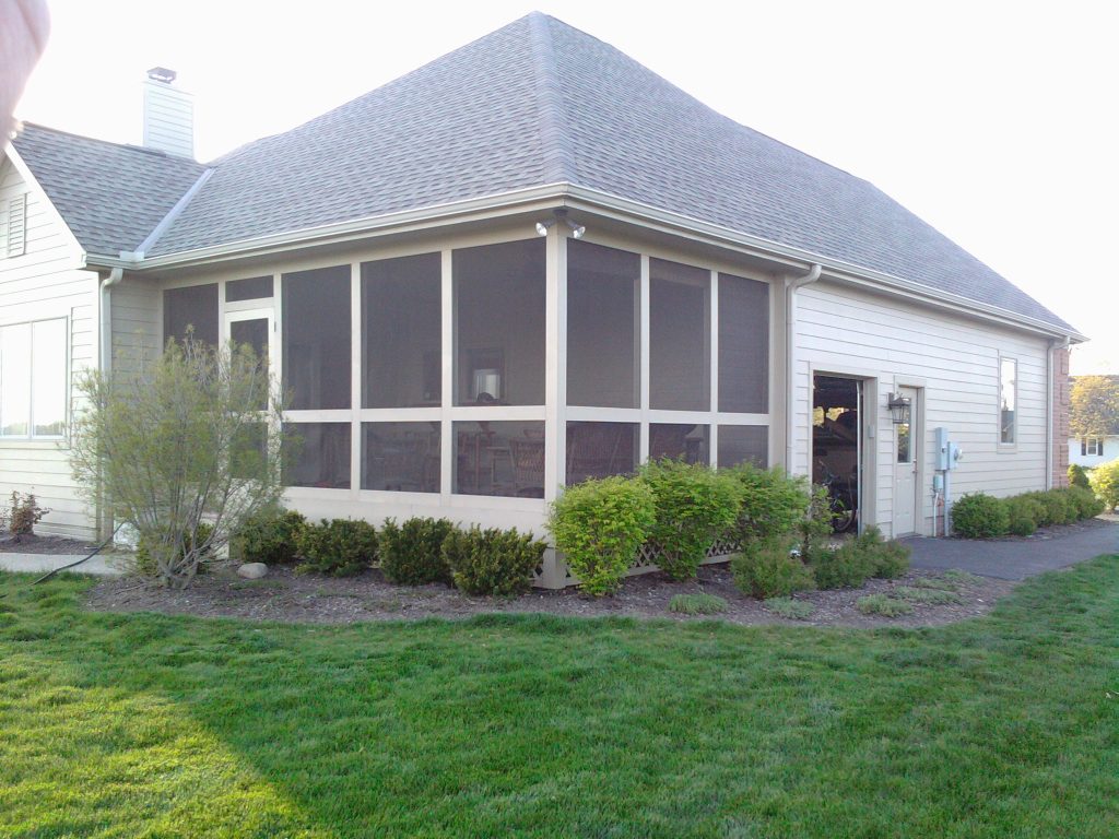 Mid-sized trendy screened-in side porch idea in Columbus with a roof extension by Headings Brothers, Inc | Outdoor Photos | Porch | Landscaping | Landscape Design | Outdoor Living Space | Porch Design Ideas | Outdoor Living Space Ideas | Backyard Design