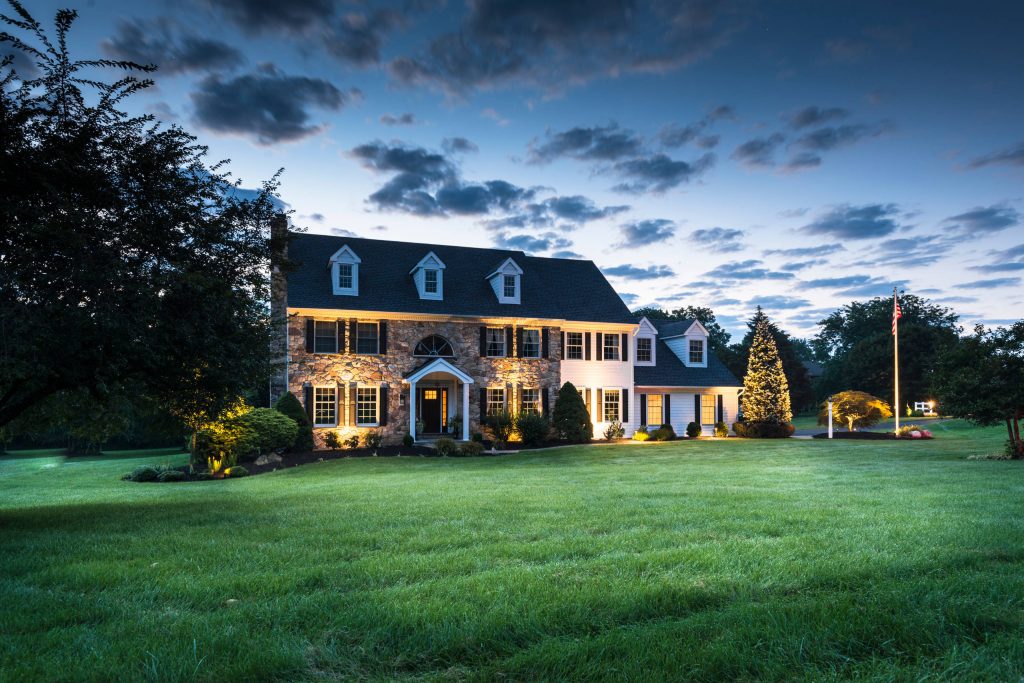 Mid-sized trendy stone front porch photo in Philadelphia with a roof extension by Chestnut Hill Landscape Contractors | Outdoor Photos | Porch | Landscaping | Landscape Design | Outdoor Living Space | Porch Design Ideas | Outdoor Living Space Ideas | Backyard Design