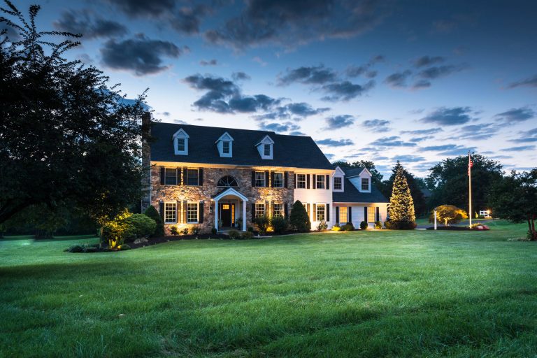 Mid-sized trendy stone front porch photo in Philadelphia with a roof extension by Chestnut Hill Landscape Contractors | Outdoor Photos | Porch | Landscaping | Landscape Design | Outdoor Living Space | Porch Design Ideas | Outdoor Living Space Ideas | Backyard Design