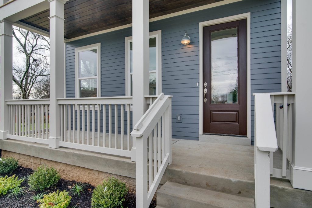 Minimalist front porch idea in Nashville with a roof extension by Potter Brothers Construction | Outdoor Photos | Porch | Landscaping | Landscape Design | Outdoor Living Space | Porch Design Ideas | Outdoor Living Space Ideas | Backyard Design
