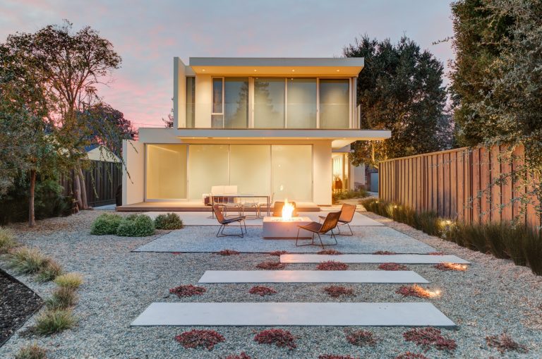 Modern landscape with different gravels and poured in place concrete.