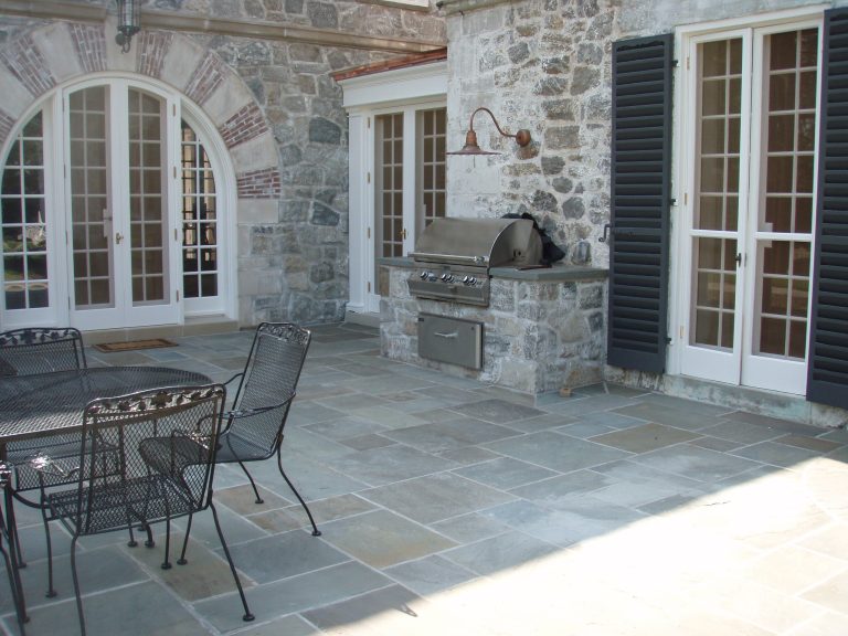 Mortared bluestone patio, grill island to match stone work on house