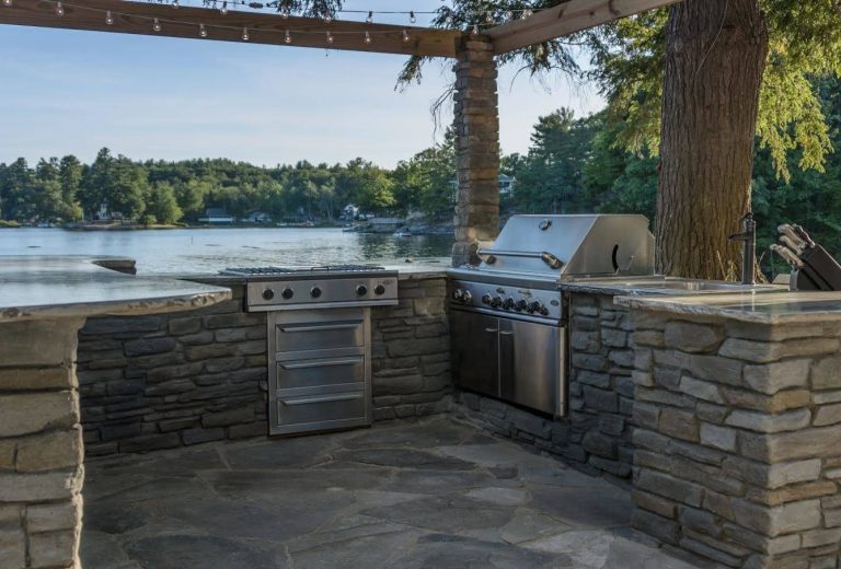 Mountain style backyard tile patio kitchen photo in Miami with no cover