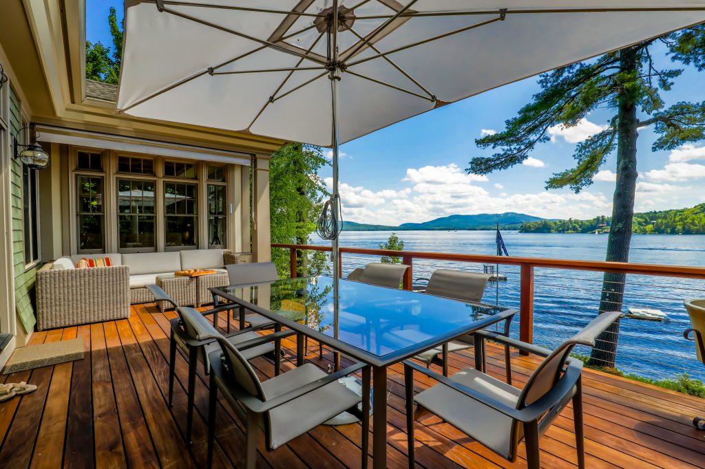 Mountain style cable railing deck photo in Boston with no cover