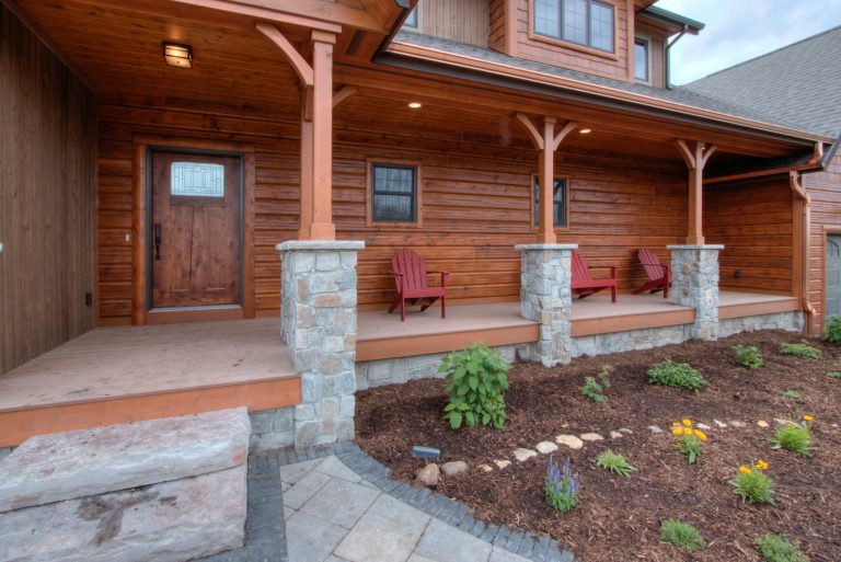 Mountain style front porch idea in Milwaukee with a roof extension by C. Weber Builders, Inc. | Outdoor Photos | Porch | Landscaping | Landscape Design | Outdoor Living Space | Porch Design Ideas | Outdoor Living Space Ideas | Backyard Design