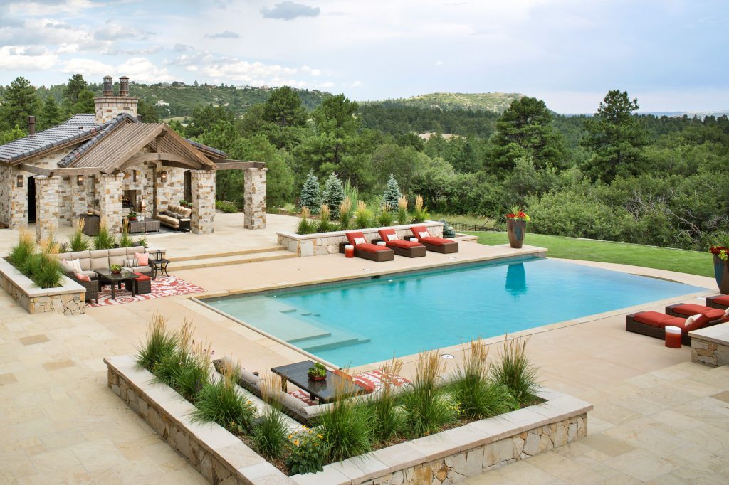 Mountain style pool photo in Denver