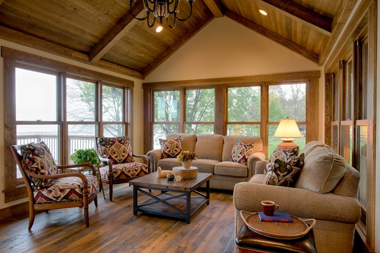 Mountain style porch photo in Minneapolis with a fire pit by Baratto Brothers Construction | Outdoor Photos | Porch | Landscaping | Landscape Design | Outdoor Living Space | Porch Design Ideas | Outdoor Living Space Ideas | Backyard Design