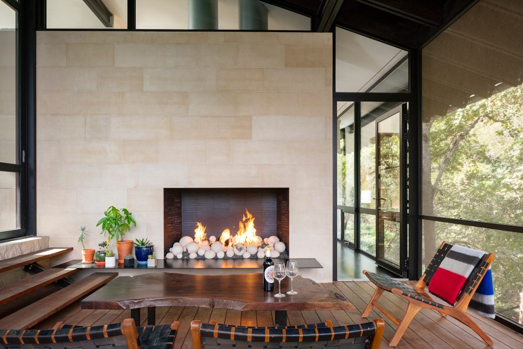 Mountain style screened-in porch idea in Austin with decking and a roof extension by Shoberg Custom Homes | Outdoor Photos | Porch | Landscaping | Landscape Design | Outdoor Living Space | Porch Design Ideas | Outdoor Living Space Ideas | Backyard Design