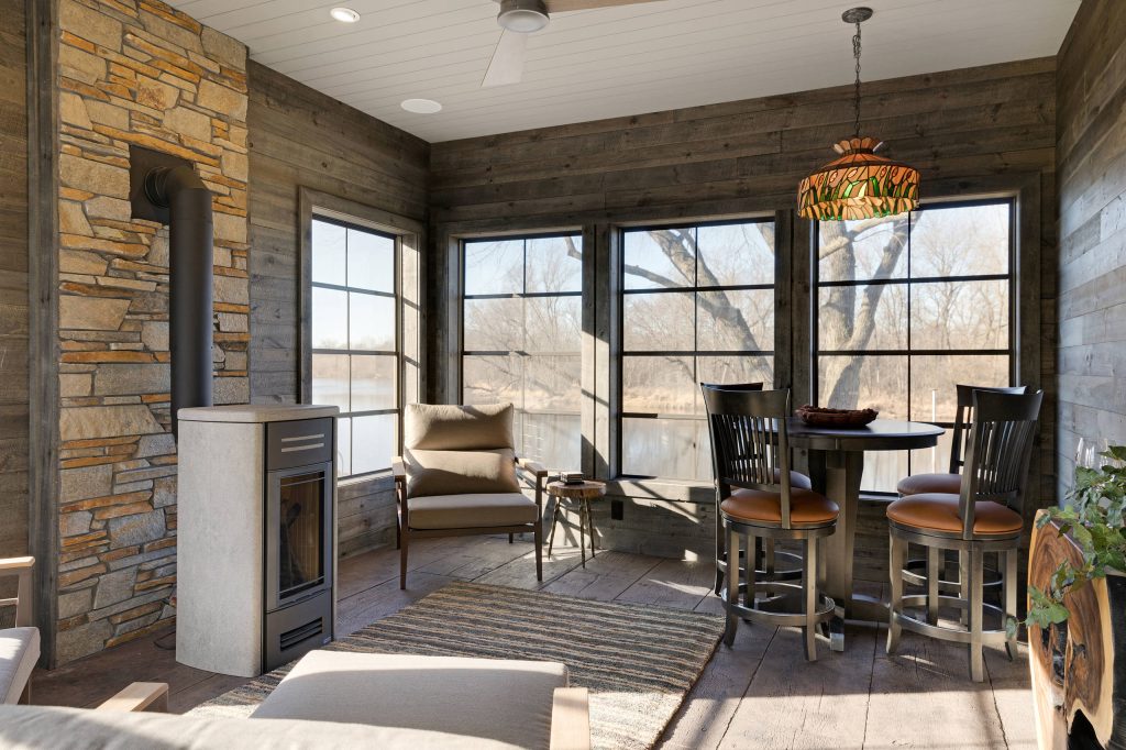Mountain style screened-in porch photo in Other by Signature Homes of the Chippewa Valley LLC. | Outdoor Photos | Porch | Landscaping | Landscape Design | Outdoor Living Space | Porch Design Ideas | Outdoor Living Space Ideas | Backyard Design