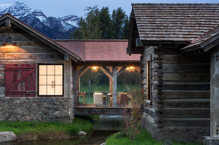 Mountain style side porch photo in Other with a roof extension by Revient Reclaimed Wood | Outdoor Photos | Porch | Landscaping | Landscape Design | Outdoor Living Space | Porch Design Ideas | Outdoor Living Space Ideas | Backyard Design