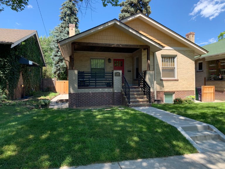 New and healthy grass landscaping. Porch wall removed for a more open area with new simple, modern railing. Basement blow out beneath with new added egress window. Red accent door. by Precision Home Builders & Precision Renovations | Outdoor Photos | Porch | Landscaping | Landscape Design | Outdoor Living Space | Porch Design Ideas | Outdoor Living Space Ideas | Backyard Design