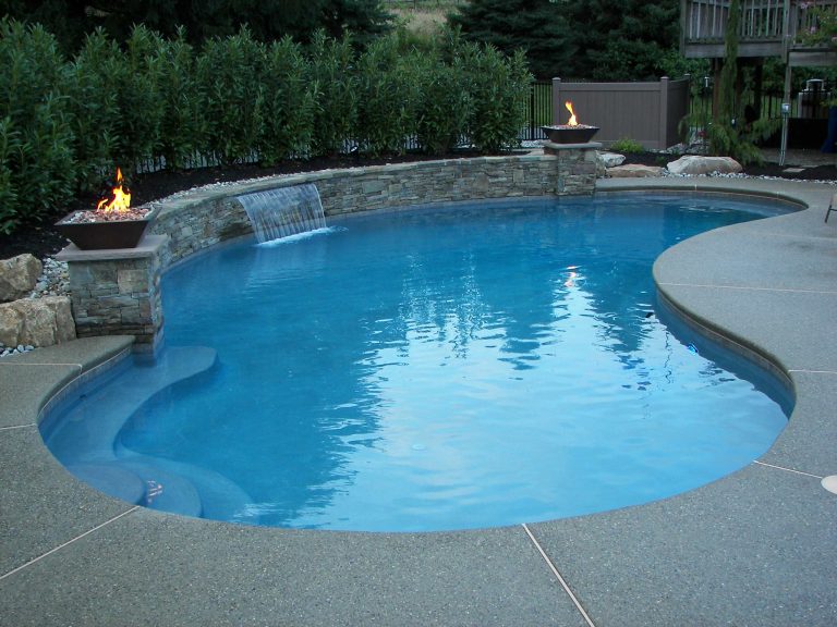 New pool built by www.custompoolsbybarry.com with raised wall & sheer descent waterfall in Weisenberg Township, Lehigh County, PA