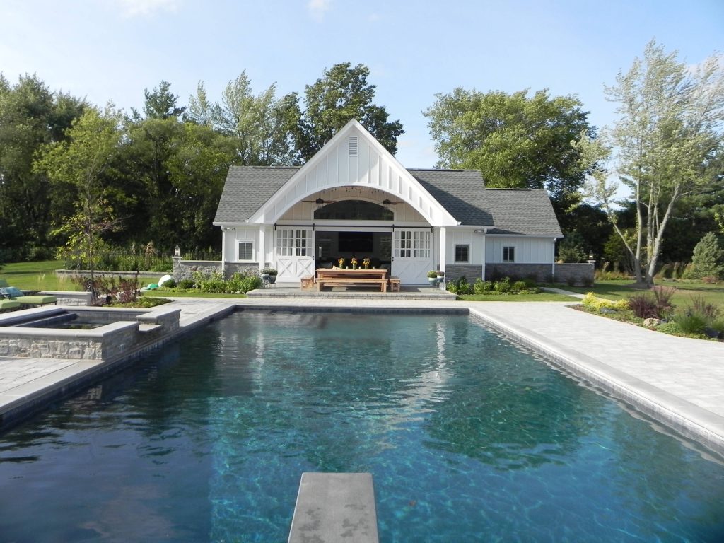 New pool house to match existing residence.