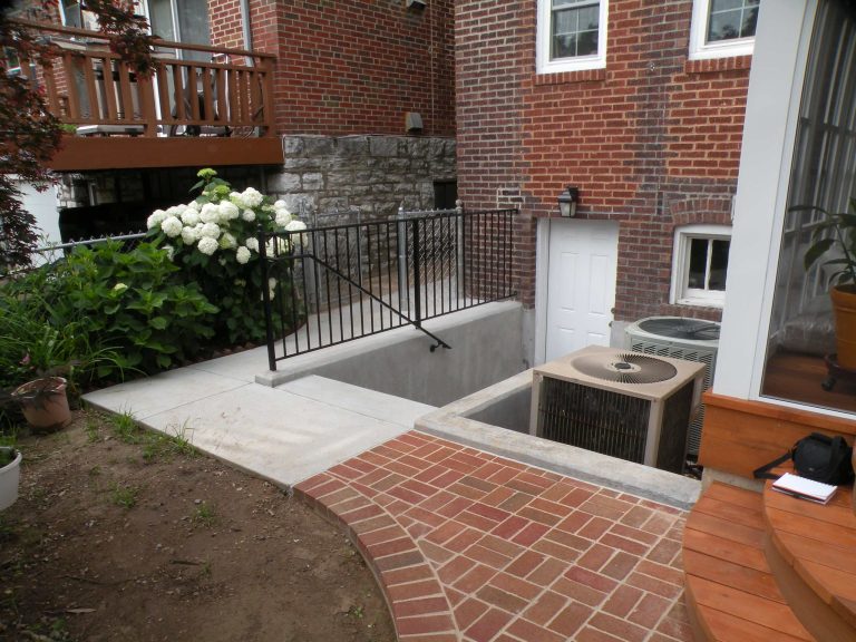 New screened-in porch and brick patio. A new stairway to the basement door allows easy access. Air condensers were lowered so that they are below the porch floor. and thus less visible. by LNB Architecture & Interiors | Outdoor Photos | Porch | Landscaping | Landscape Design | Outdoor Living Space | Porch Design Ideas | Outdoor Living Space Ideas | Backyard Design