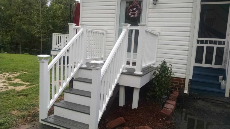New side porch. Vinyl railings.