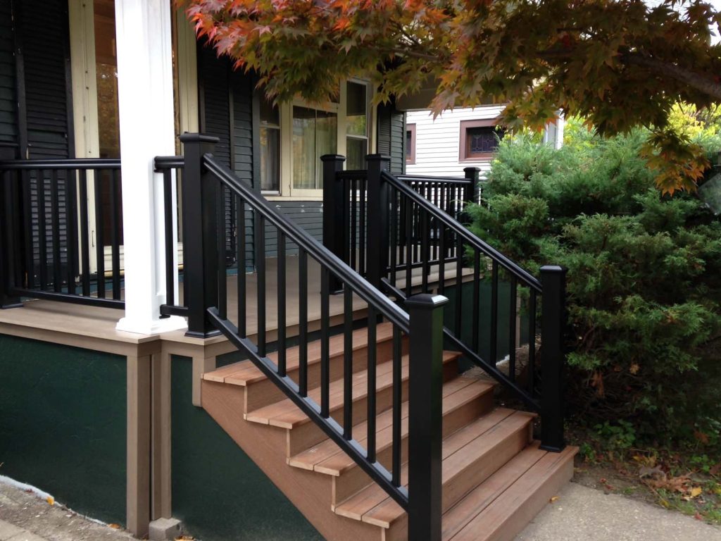 New tongue and groove composite decking. PermaCast fiberglass columns Composite railings.