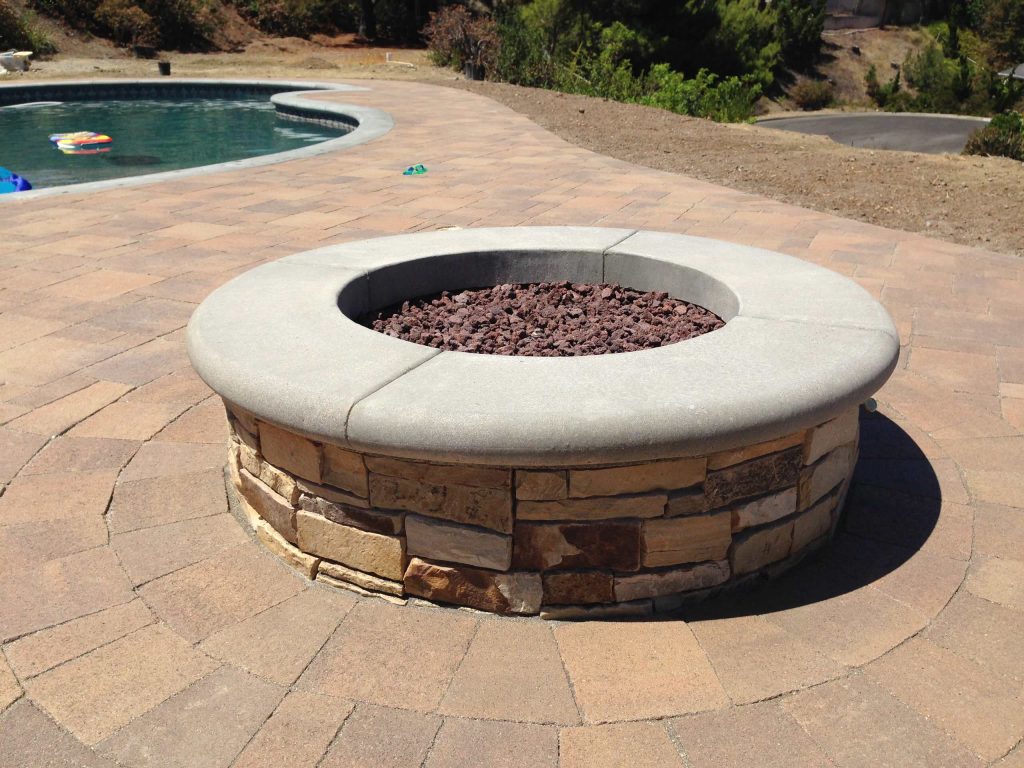 Newly remodeled pool deck and backyard, We installed the Orco Pietra Cobble in the 5 pc package. Color Tuscany.