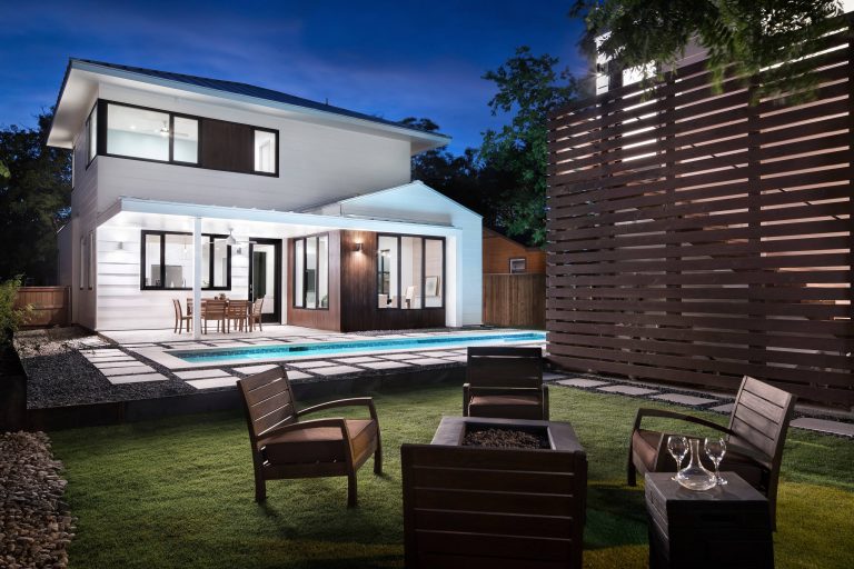 On a compact lot, the pool was placed between the garage apartment and the main house, providing privacy and a courtyard feel.