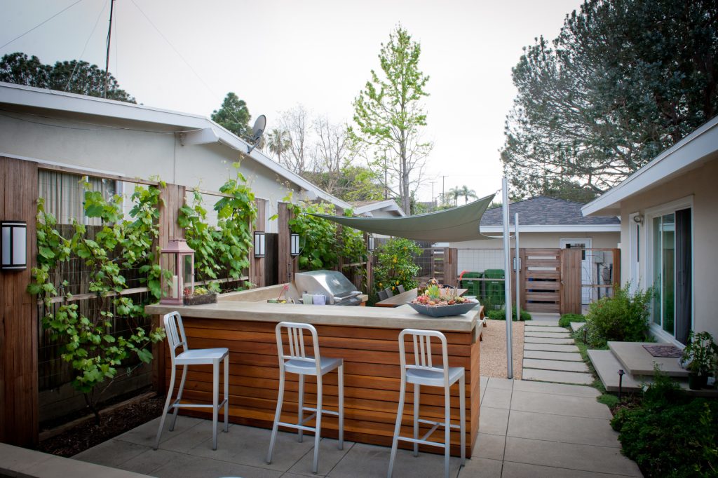 On sunny days, a sail covers the picnic area and shades the outdoor kitchen and bar. Photo: Lesly Hall