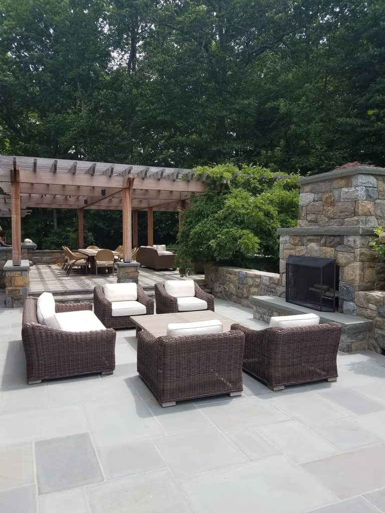 Open patio seating by the fireplace.