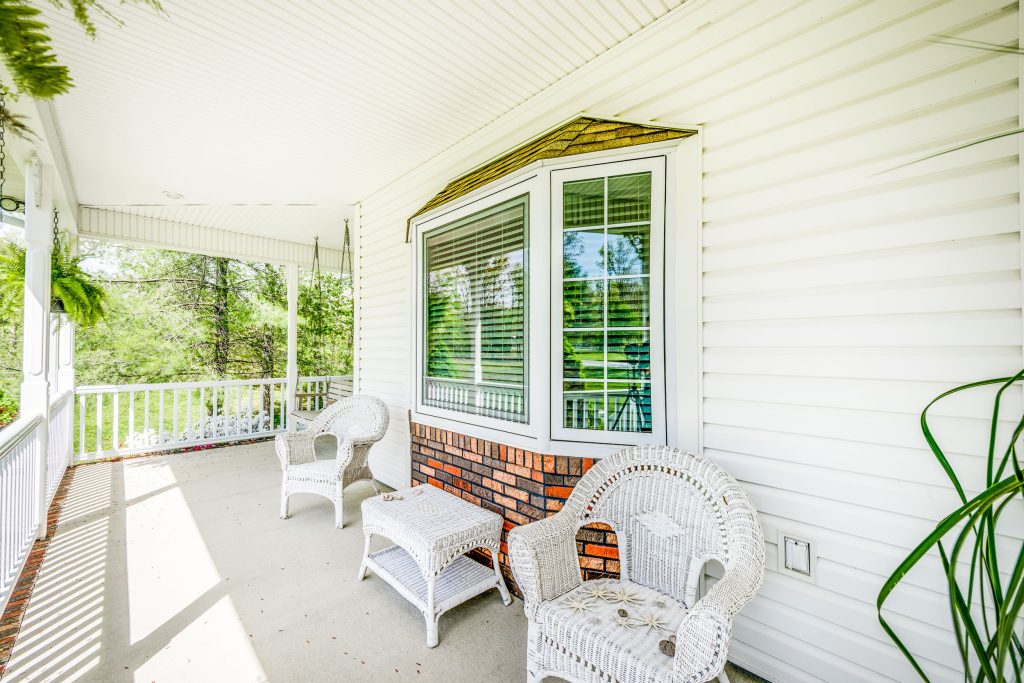 Ornate porch idea in Nashville by Britt Development Group, LLC | Outdoor Photos | Porch | Landscaping | Landscape Design | Outdoor Living Space | Porch Design Ideas | Outdoor Living Space Ideas | Backyard Design