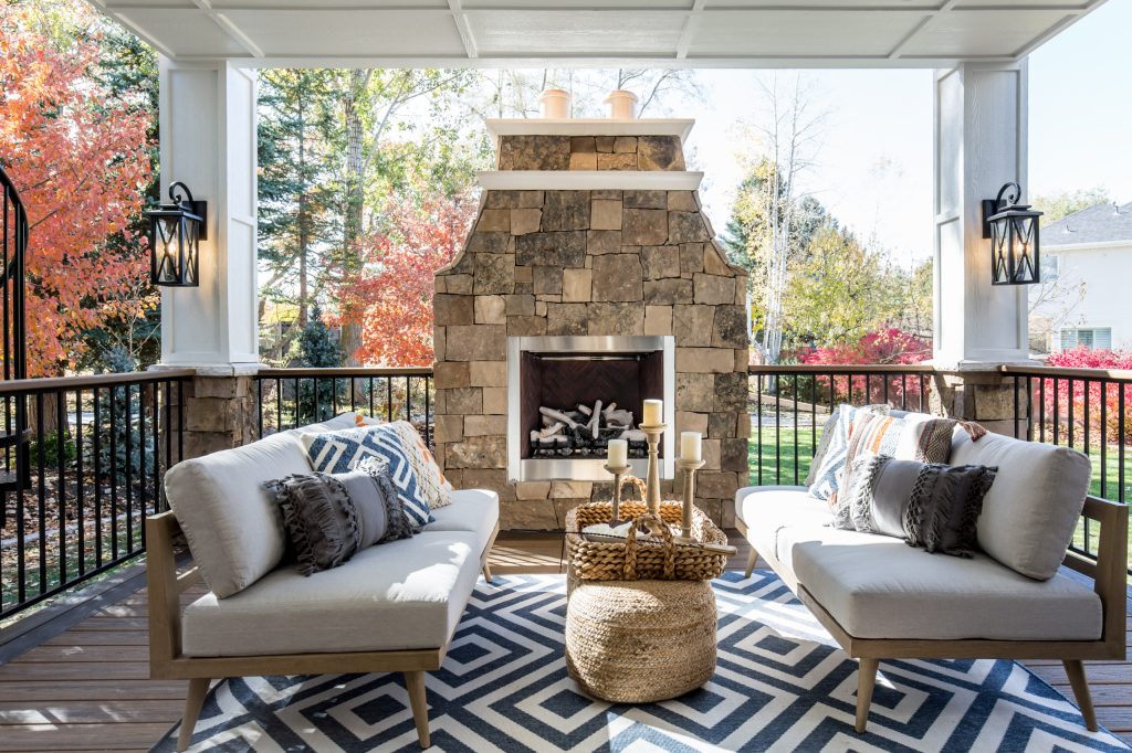 Outdoor entertainment and living area complete with custom gas fireplace.