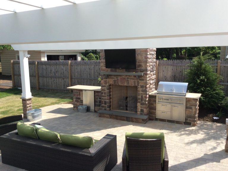 Outdoor fireplace, outdoor BBQ and prepping station. Plenty of sitting space.