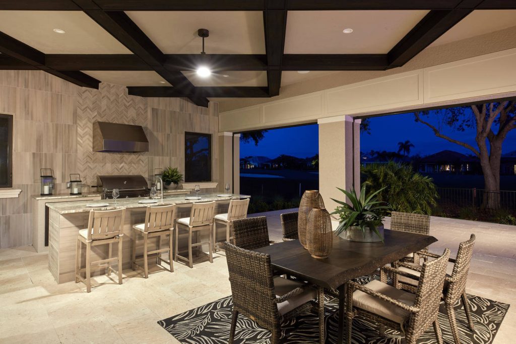 Outdoor kitchen, bar and dining.