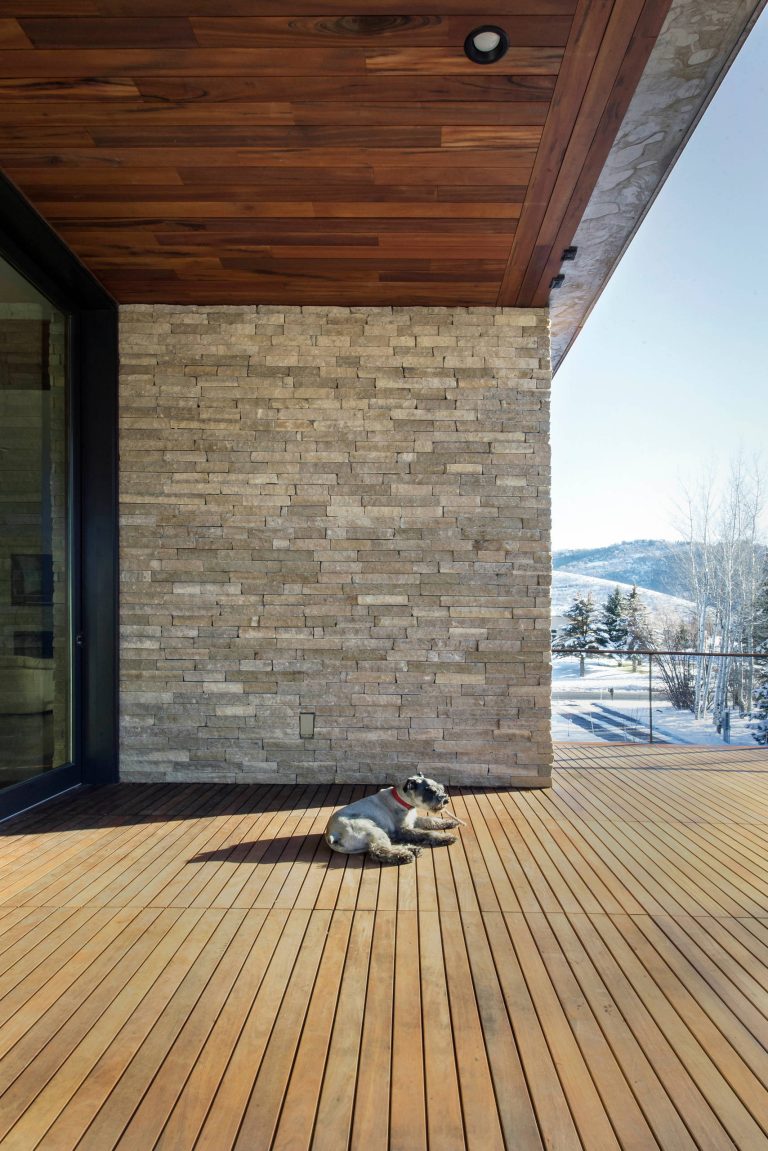 Outdoor kitchen deck - huge contemporary rooftop outdoor kitchen deck idea in Salt Lake City with a roof extension