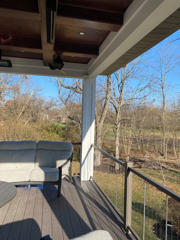 Outdoor kitchen deck - large contemporary backyard outdoor kitchen deck idea in Other with a roof extension