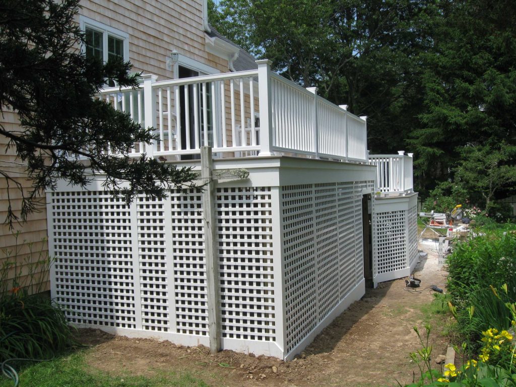 Outdoor kitchen deck - large traditional backyard outdoor kitchen deck idea in Boston with no cover