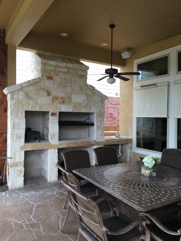 Outdoor kitchen deck - large traditional backyard outdoor kitchen deck idea in Other with a roof extension