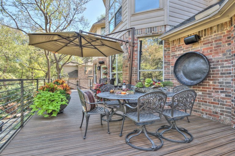Outdoor kitchen deck - large transitional backyard outdoor kitchen deck idea in Dallas with no cover