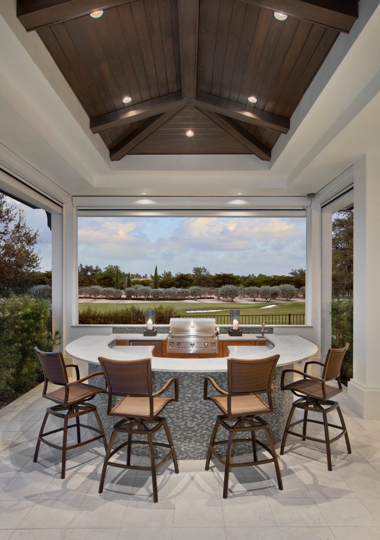 Outdoor kitchen deck - large transitional backyard outdoor kitchen deck idea in Miami with a roof extension