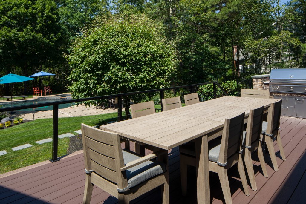 Outdoor kitchen deck - mid-sized transitional backyard outdoor kitchen deck idea in Philadelphia with no cover