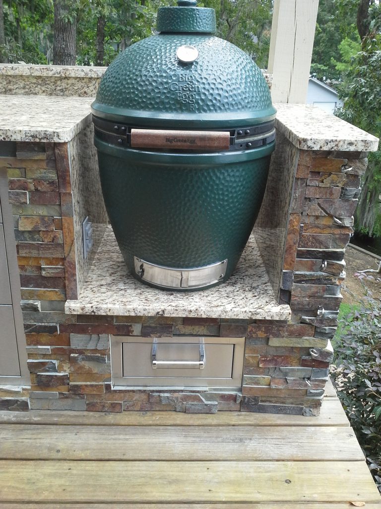 Outdoor kitchen deck - traditional outdoor kitchen deck idea in Other with a pergola