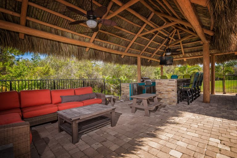 Outdoor kitchen oasis in Palm City, Florida Photography by Kaunis Hetki Photography