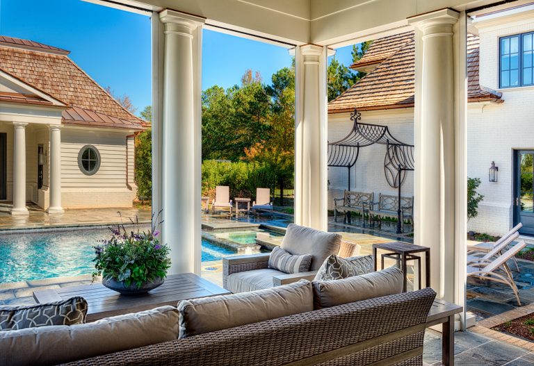Outdoor living area overlooking the in-ground pool.Getz Creative Photography