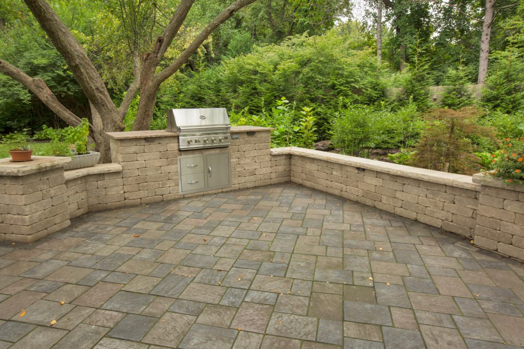 Outdoor living space with grill area in Indianapolis, Indiana designed and installed by Aspen Outdoor Designs.